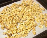 A picture of step 1 of Cinnamon-Scented Caramelized Walnuts.