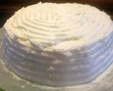 A picture of step 6 of sunshines cranberries buttercream cake.