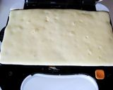A picture of step 5 of Fluffy Waffle Roll Cake.