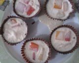 A picture of step 2 of Fruity gelatin in cups.