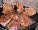 A picture of step 4 of Juicy Pan Fried Porkchops.