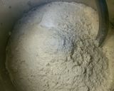 A picture of step 2 of Dad's deep-dishy pizza.