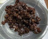 A picture of step 1 of Mirin-Pickled Raisins.