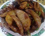 A picture of step 4 of Chilli potato wedges.