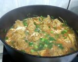 A picture of step 8 of Dumpling In Thai Chili Broth.