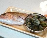 A picture of step 1 of Acqua Pazza made in a Tajine.