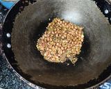 A picture of step 1 of Stuffed brinjal curry.