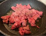 A picture of step 7 of Beef and Black Bean Crunch Burritos.