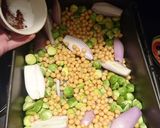 A picture of step 3 of Tamarind sprouts with shallots, peanuts and chickpeas.