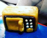 A picture of step 7 of Kitchen Themed Cake.