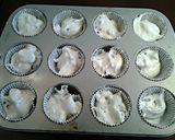 A picture of step 7 of Chocolate Chip Angel.Food Cupcakes with Chocolate Whipped Cream Frosting.