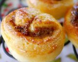 A picture of step 14 of Raisin and Cream Cheese Rolls.