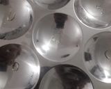 A picture of step 5 of Choco Idli Muffins by Oreo biscuits.