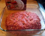 A picture of step 5 of Meatloaf with rice in the middle.