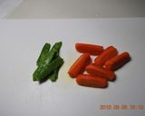 A picture of step 1 of Glazed Carrots and Greens.