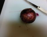 A picture of step 1 of How to: Cutting an onion.