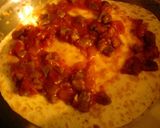 A picture of step 11 of Turkey Quesadilla Pizzas.