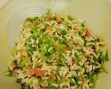 A picture of step 2 of Stir fried salad rice.