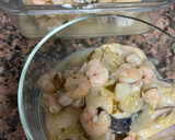 Foto del paso 4 de la receta: Merluza en salsa con gambita congelada