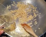 A picture of step 4 of Risotto with Fuji Apples, Crispy Bacon, and Rosemary.
