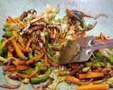 A picture of step 4 of Veg Noddles with dry manchurian balls.