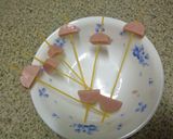 A picture of step 1 of Easy To Eat Fish Sausage and Pasta Soup.