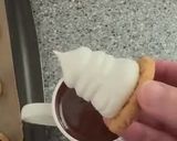 Foto del passaggio 7 della ricetta Moretti - Meringhe al Dulce de Leche e Cioccolato