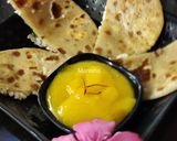 A picture of step 11 of Oats Paneer stuffed coin paratha with Aamras.
