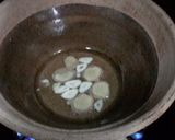 A picture of step 1 of Kanya's Tofu and Leeks in Clay Pot.