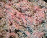 A picture of step 1 of Applesauce and Sausage Sauce.