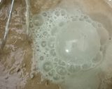 A picture of step 4 of Delicious Gulgule (Dumplings) in an Appe Pan.
