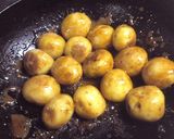 A picture of step 5 of Small New Potatoes Sautéed Teriyaki Style in Sweet and Sour Miso.