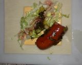 A picture of step 2 of Brat/hot dog cheesy egg rolls.
