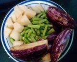 A picture of step 1 of Cowpea beans , potato and brinjal Puli kulambu / tamarind based gravy.