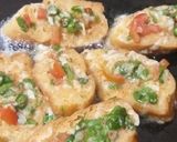A picture of step 4 of Omellte coated dinner roll.