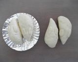 A picture of step 4 of Halloween Twin Ghosts Bread.