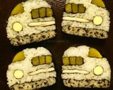 A picture of step 19 of Decorated Sushi Rolls: Snowmen Nori Rolls.