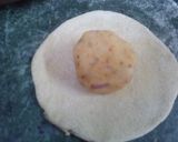A picture of step 8 of Aalu Paranttha (potato stuff brush fried bread).