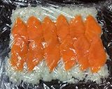 A picture of step 3 of Avocado Salmon Philadelphia Rolls.