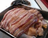 A picture of step 4 of Applewood bacon wrapped chicken with brown sugar.