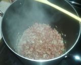 A picture of step 1 of Smokey Blue Ribbon Cheese Soup.