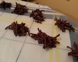 A picture of step 5 of Chocolate Chinese Noodle "Spider" Cookies.