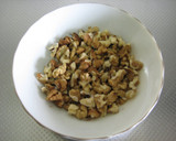 A picture of step 2 of Stir Fried Cabbage and Walnuts with Lemon Butter.