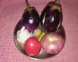 A picture of step 1 of Baingan ka Bharta.