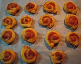 A picture of step 7 of Pizza-Flavored Rolled Puff Pastries.
