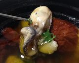 A picture of step 10 of Ajillo with Japanese Leek and Dried Tomatoes.