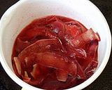 A picture of step 5 of Pink Hued Apple Jam using Red Gold Apples.