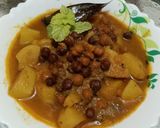 A picture of step 8 of Desi Spiced Chickpeas and Potatoes.