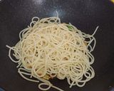 A picture of step 3 of Spaghetti with sausages.