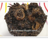 Foto del paso 9 de la receta: Arroz negro con calamares y salsa alioli
